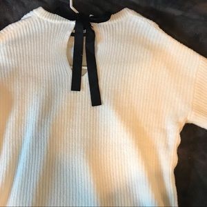 A new day white sweater with black bow detail